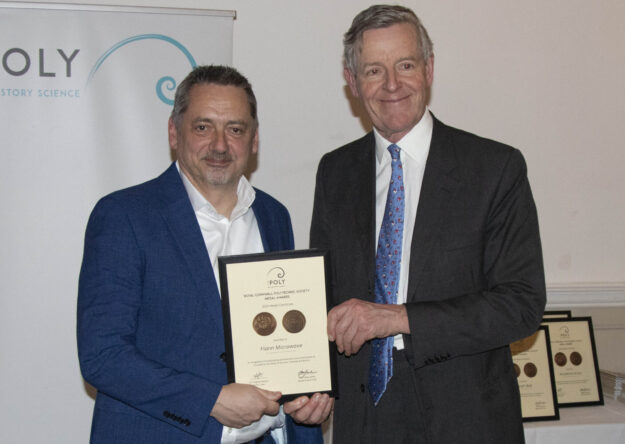 Flann receiving an award for outstanding achievement and contribution to Cornwall in the field of Industry at The Poly Awards 2026